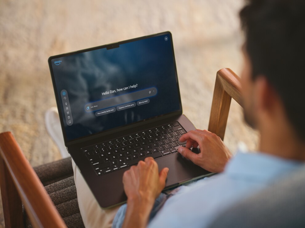 A man chats to Alexa+ on his laptop