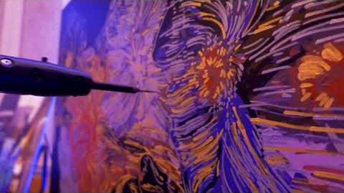 AWS re:Invent - Acrylic Robotics paints Norval Morrisseau painting