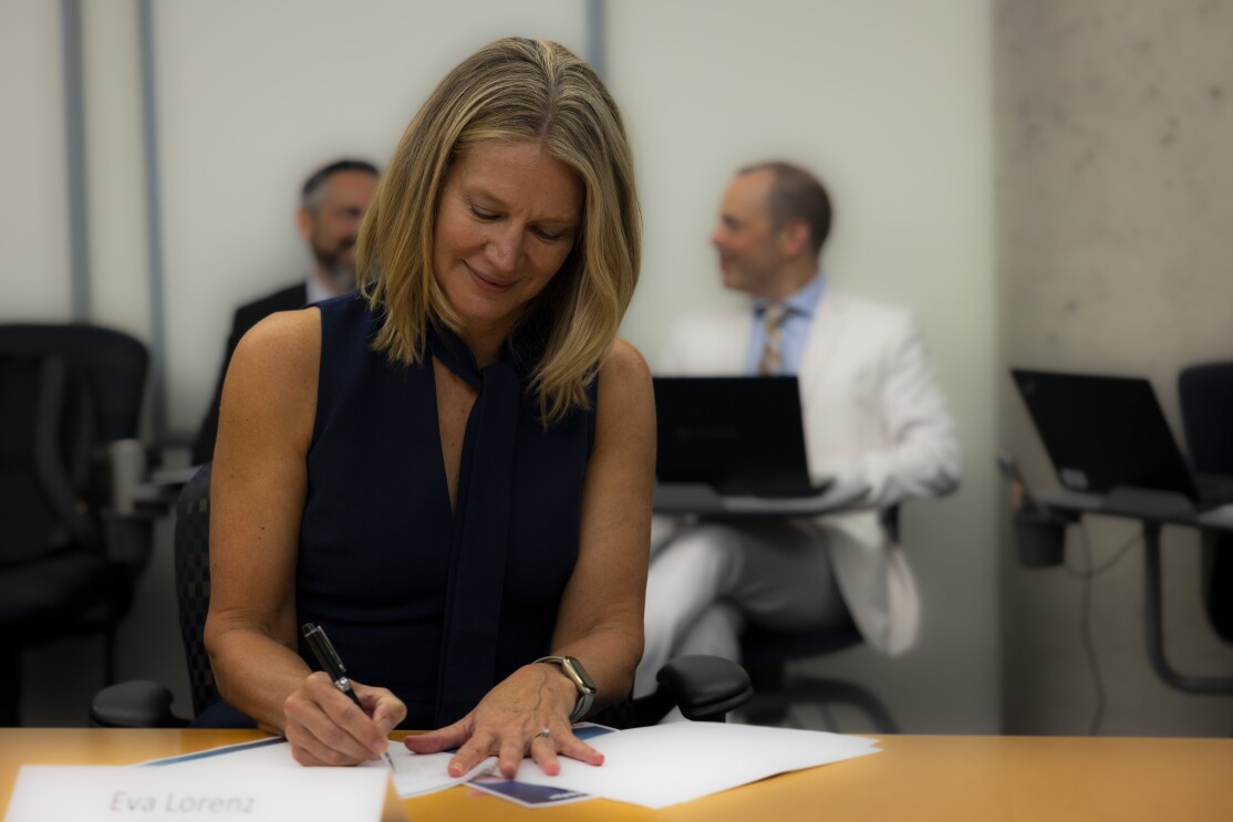 Eva Lorenz, Country Manager, Amazon Canada, signing the Canadian Product Safety Pledge