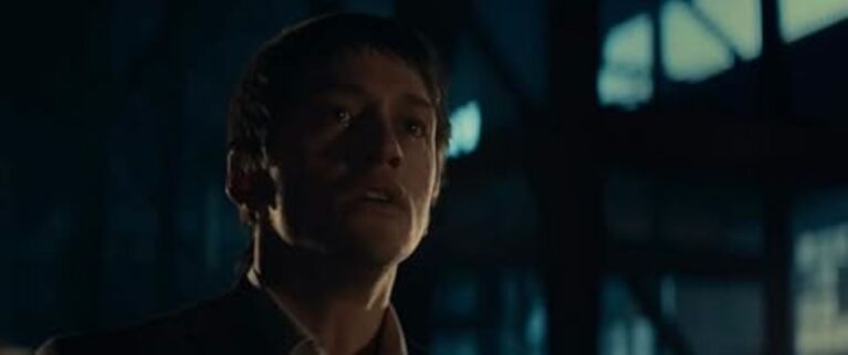 A boy staring into space