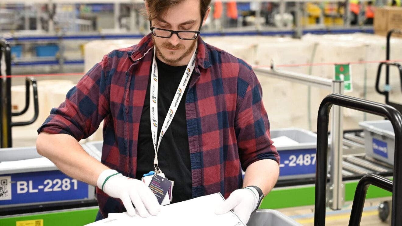 James checks prints for quality assurance