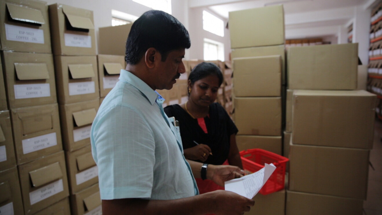 Sivaraj of the Espresso brand of knitwear at his workplace and with his family