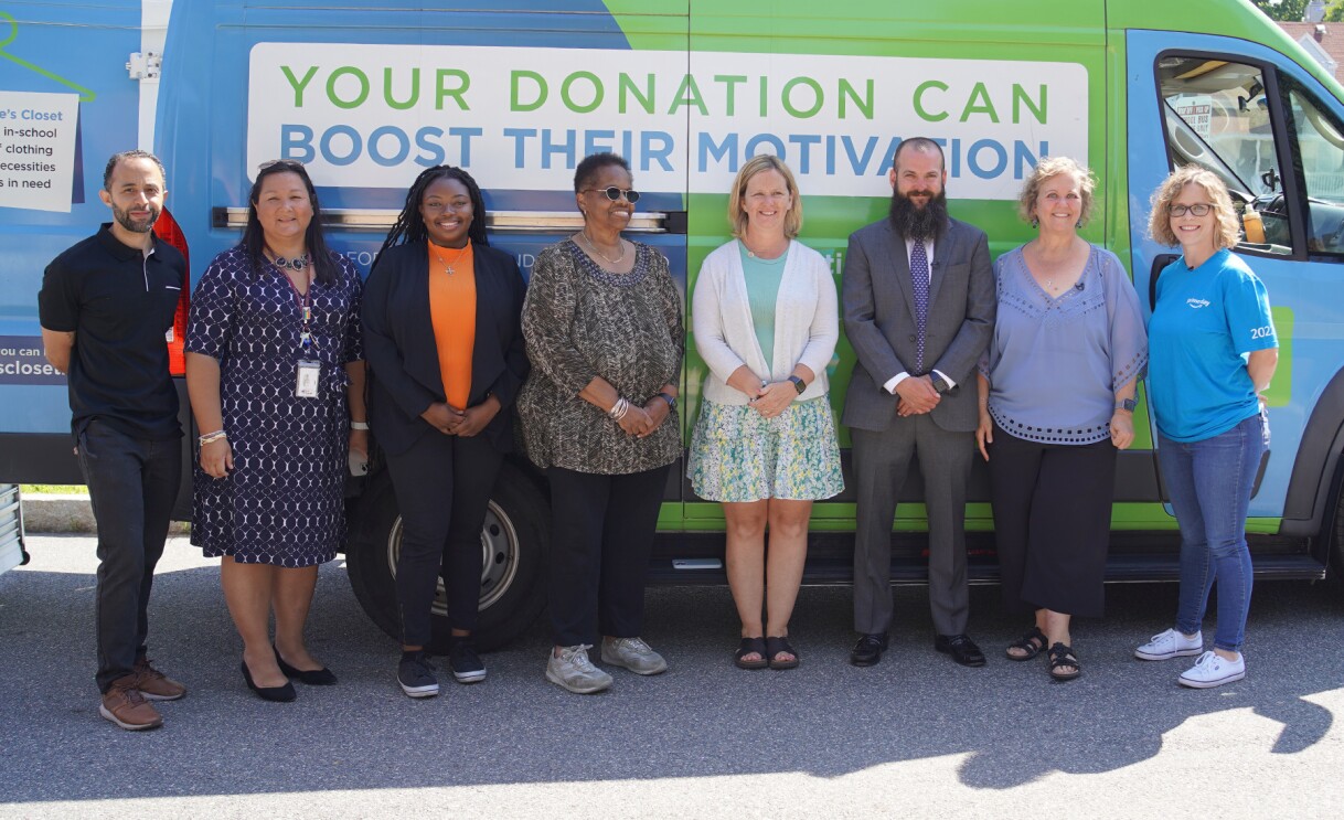 Amazon employees surprise nonprofits and schools with donations of various items.