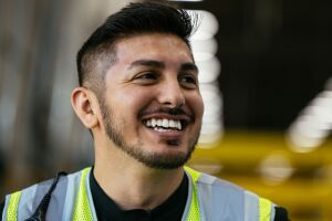 An image of Amazon employee Francisco Nino in a work vest at Amazon in Greenwood, Indiana.