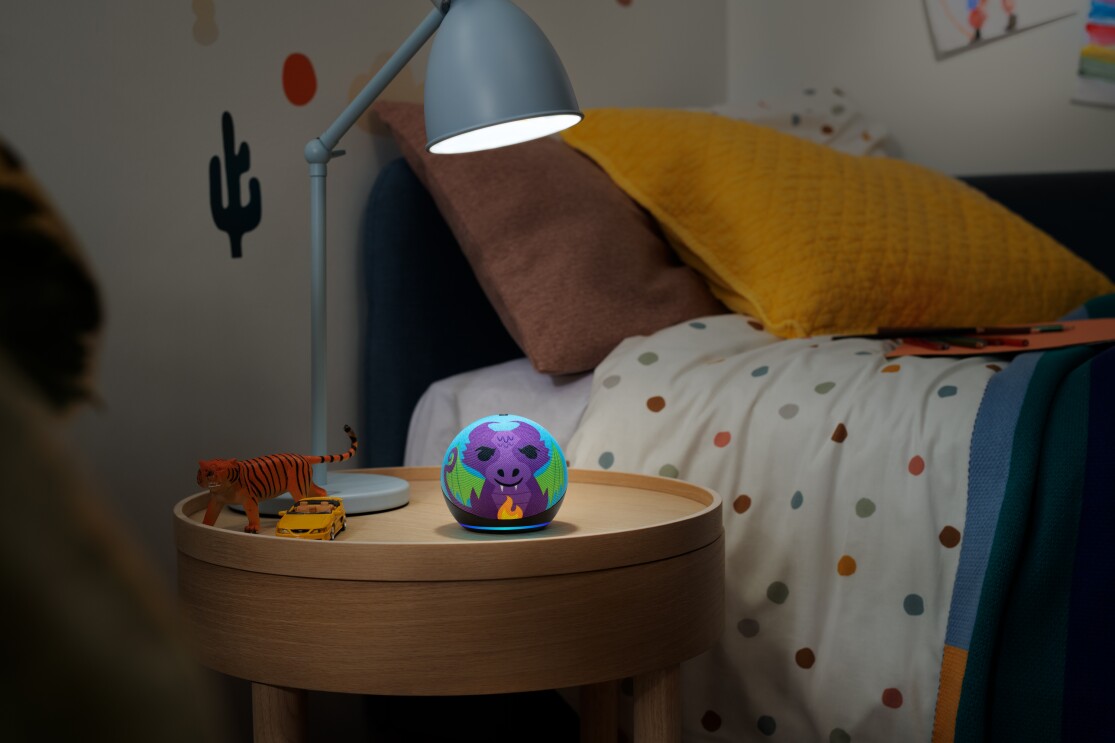 Echo Dot Kids, Dragon, sits on a nightstand