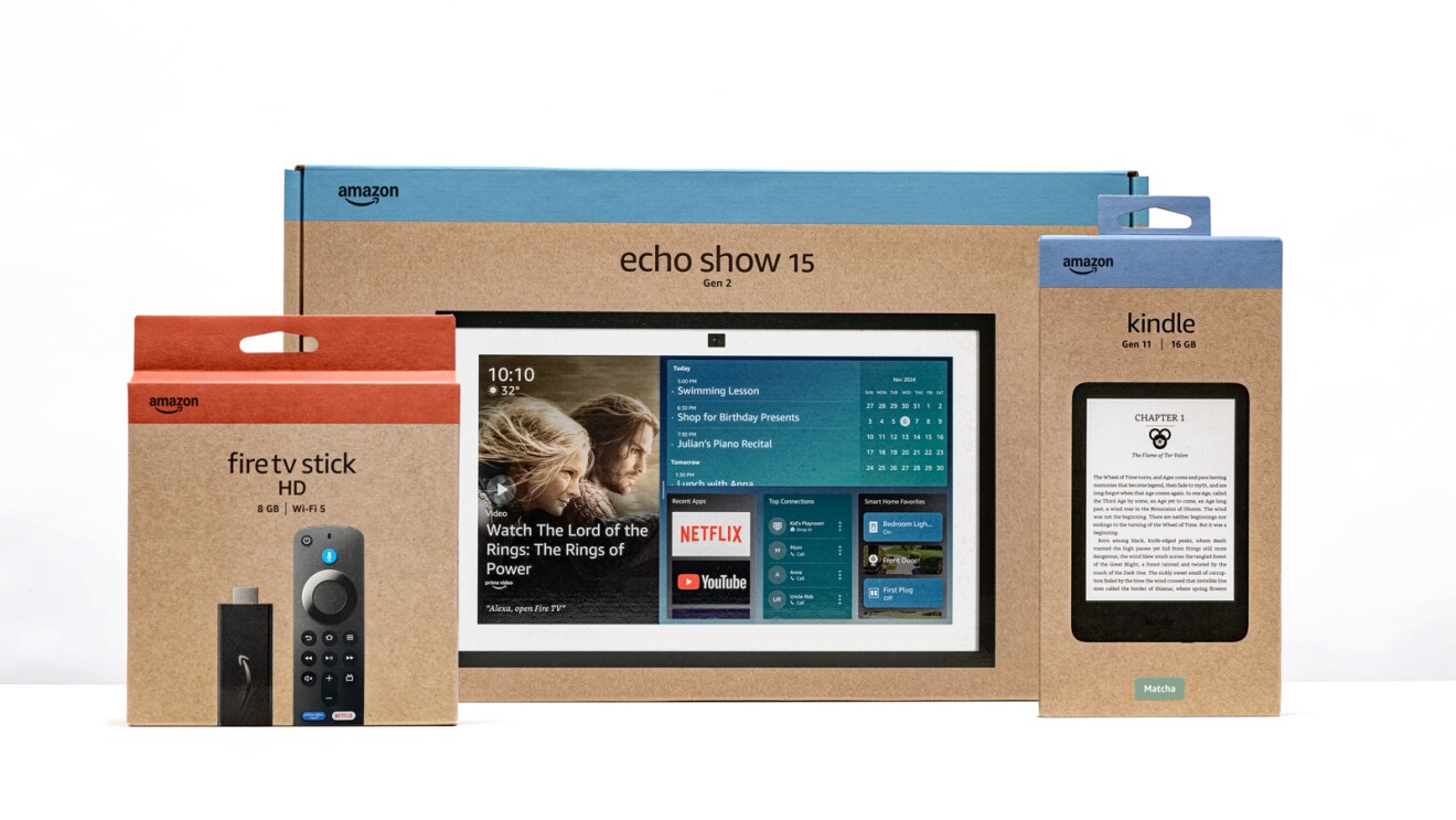 Amazon Echo Show 15, Fire TV Stick HD, and Kindle e-reader product boxes