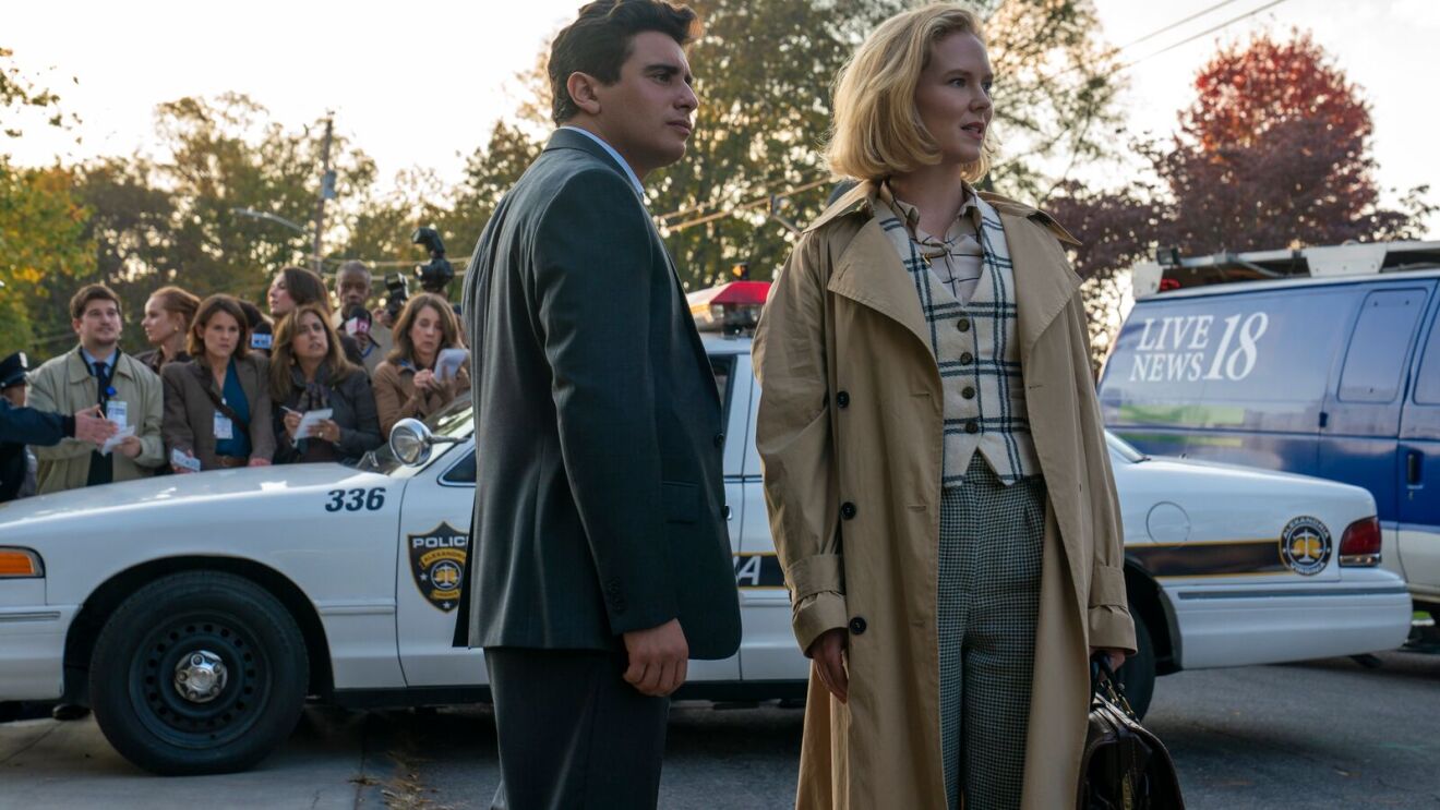 Investigators at active crime scene with police and media presence