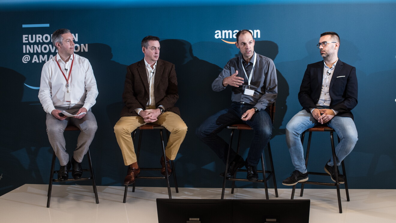Moderator Graeme Smith, Terry Hanold (Vice President International Consumer Technology), Ralf Herbrich (Director Machine Learning Science) and Rafal Kuklinski (Director Text-to-Speech) discussed the Day 1 culture in the European Amazon Development Centers