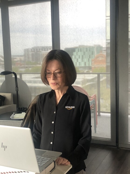 A woman on a laptop computer, working from home