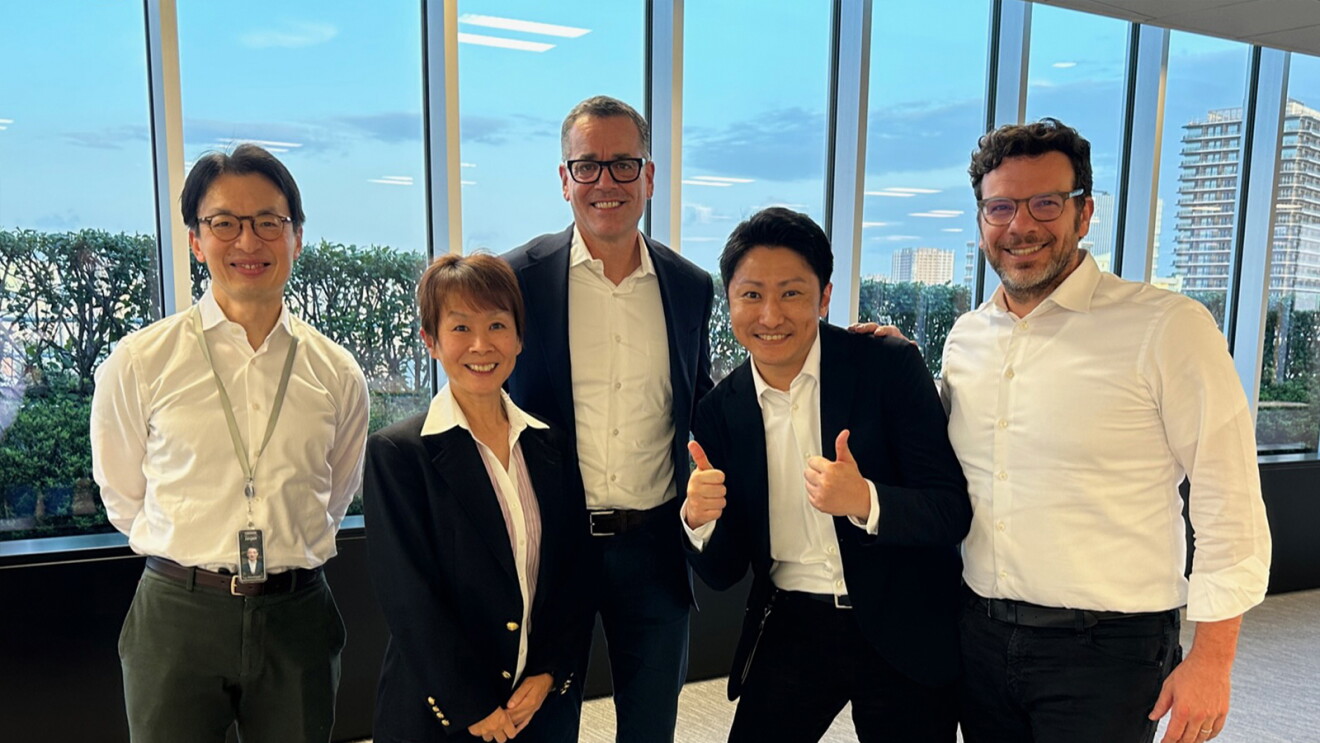 An image of Amazon Stores CEO, Doug Herrington, visiting Amazon employees in Japan.