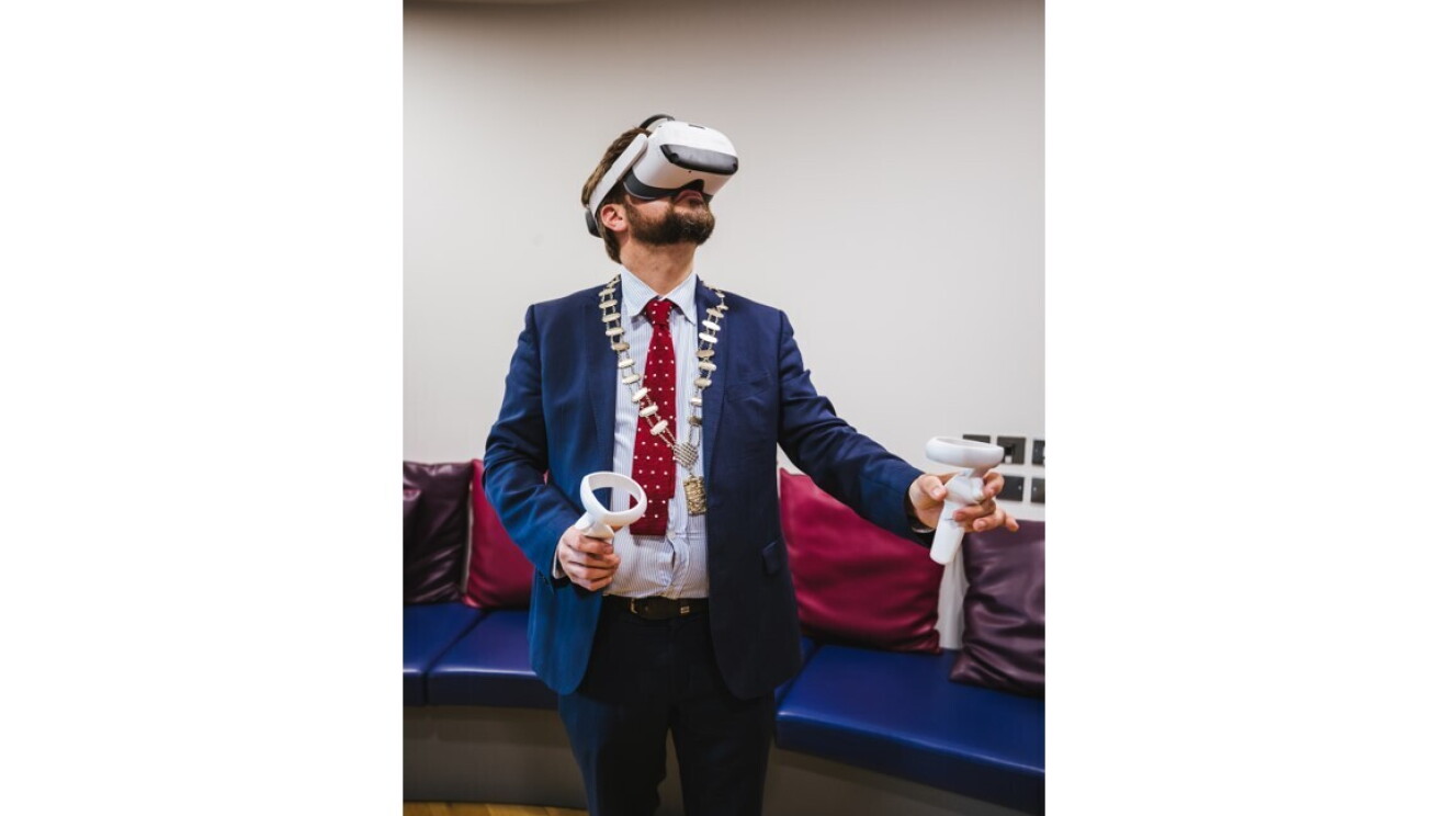 Mayor with headset - AWS Think Big SPace
