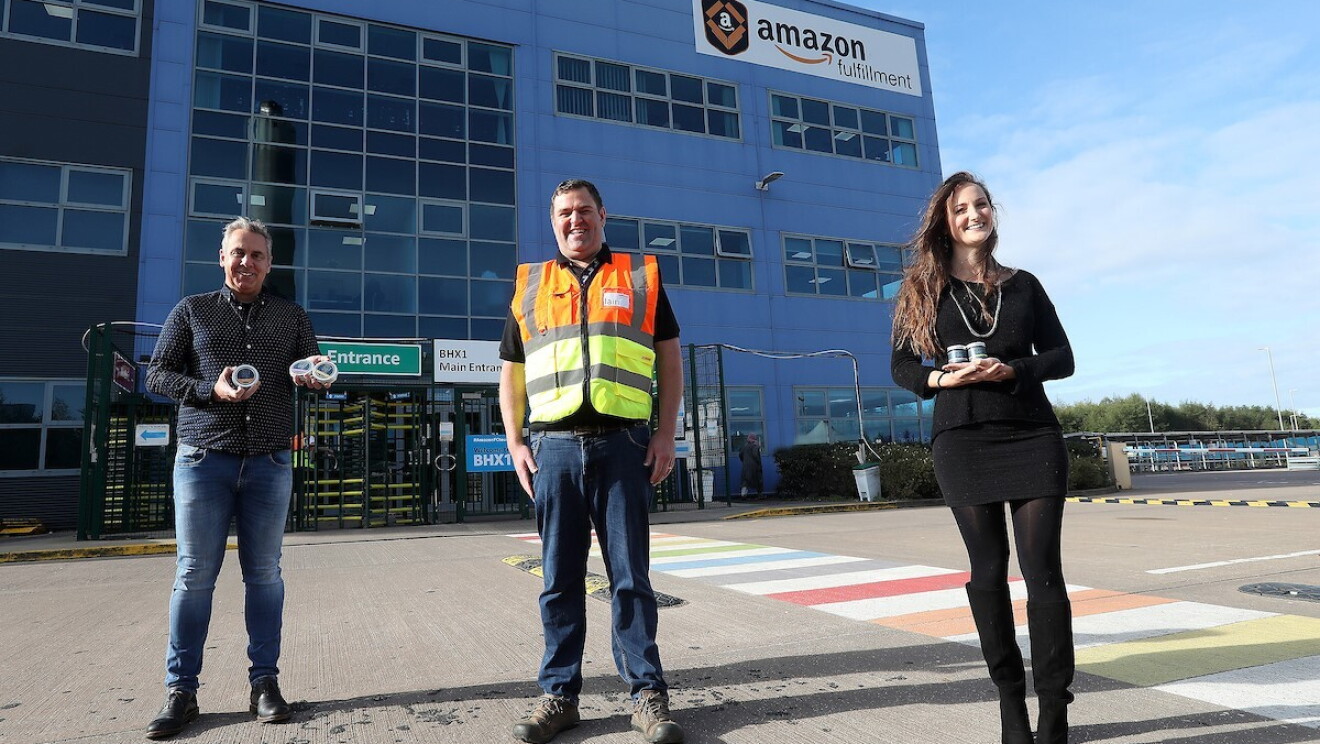 The Ilex Wood business owners stood in front of Amazon 