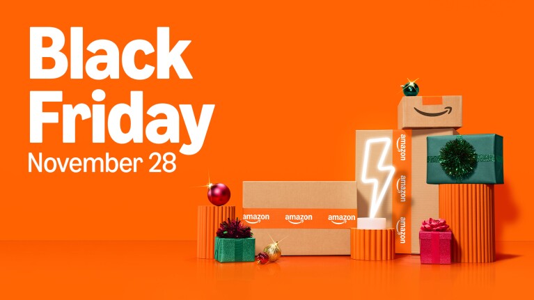 Amazon Black Friday November 28 graphic with stacked packages and holiday decorations