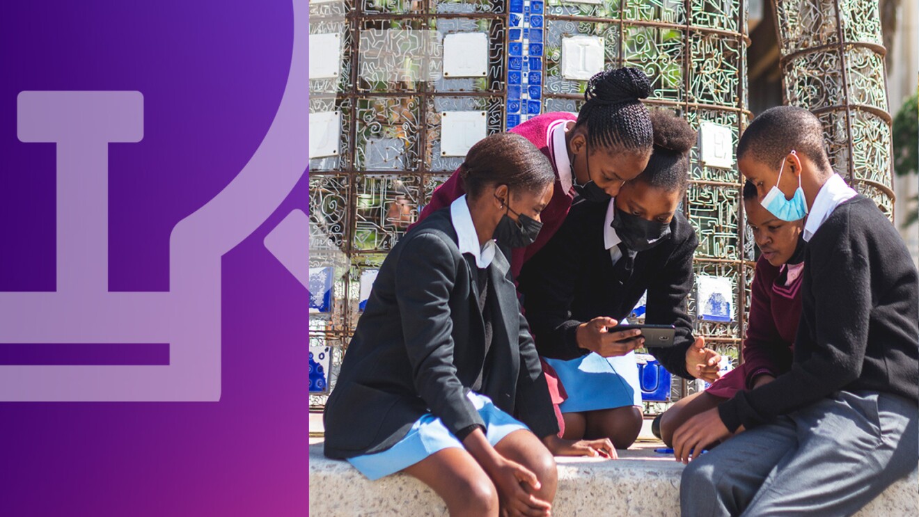 An image of students learning coding skills.