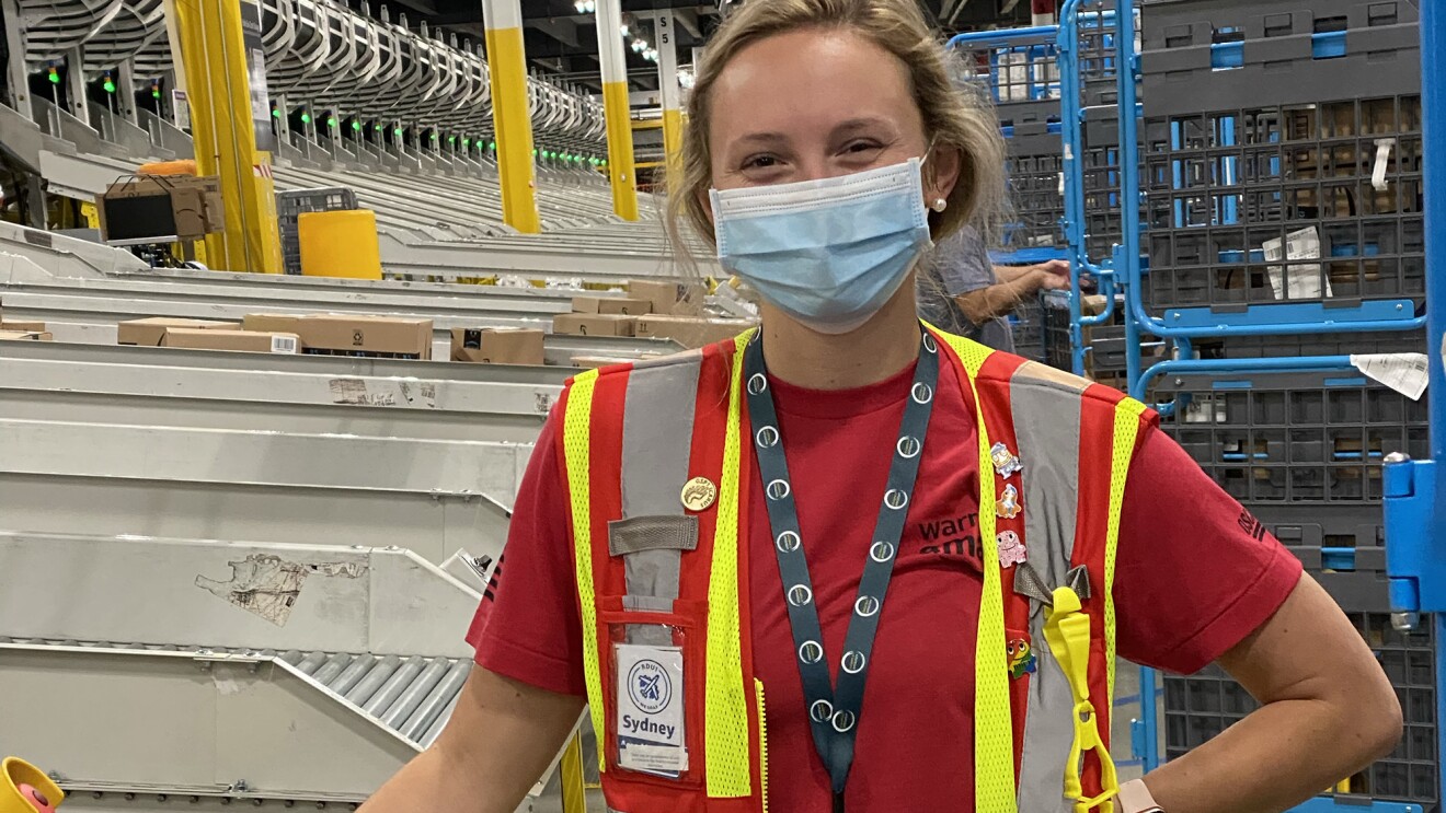 Amazon launches new technology to support military spouses 10 An Amazon employee smiles at the camera