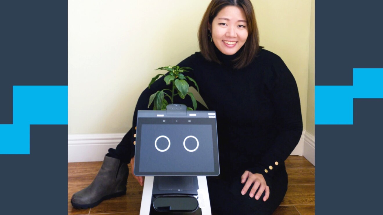 An image of Dr. Hae Won Park with Amazon's home robot, Astro and a blue background with a light blue line. 