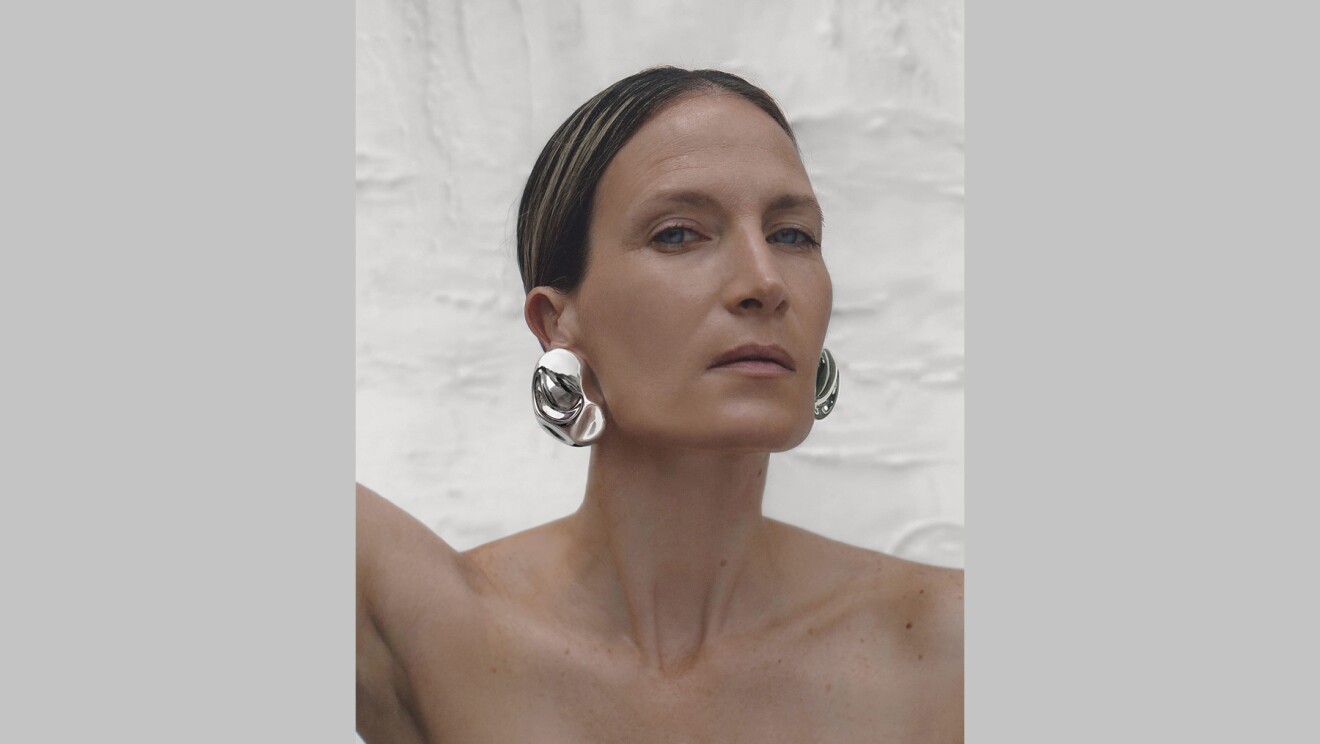 An image of a model wearing earrings by sordo. 