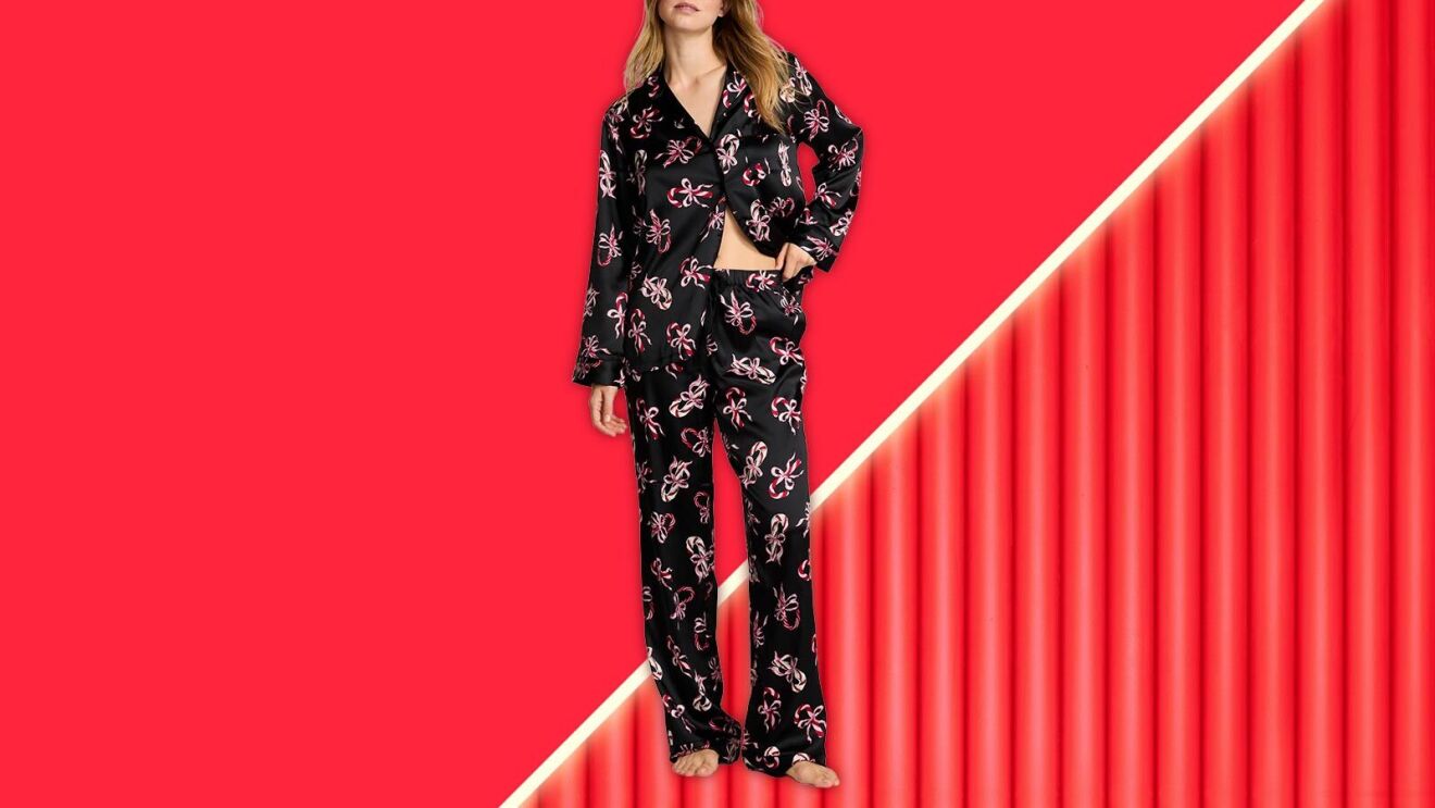 Black and pink floral print pajamas against vibrant red