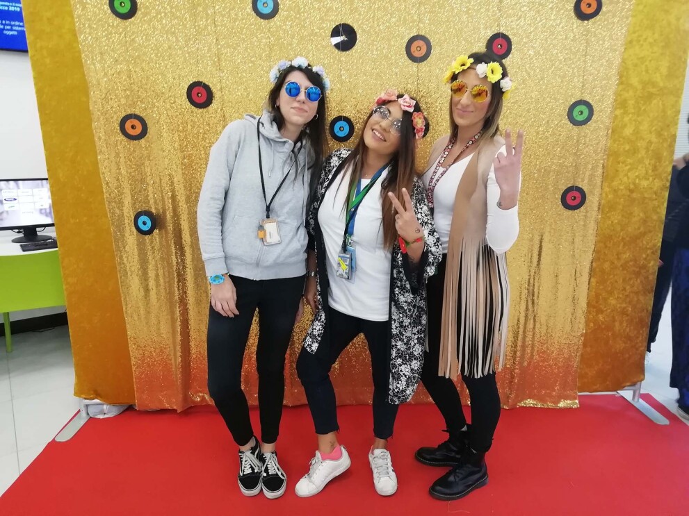 Amazon associates in our Milan fulfillment center participate in a 70s theme