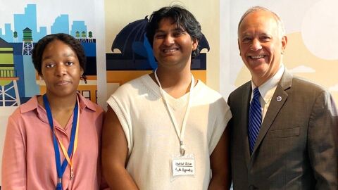 how to make a resume google docs An image of Amazon apprentices smiling to the camera.