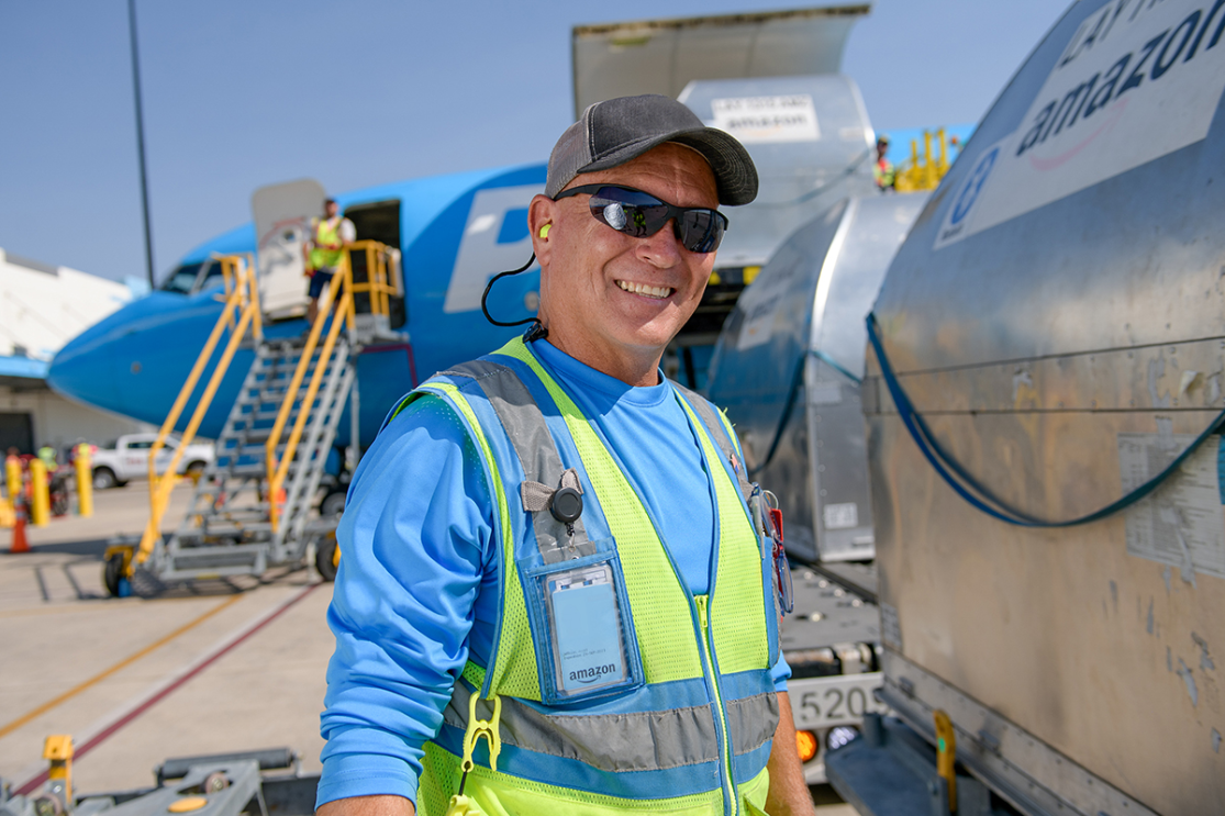 An image of Adam, an operations employee at Amazon.