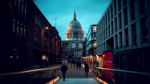 People walking down a street in London