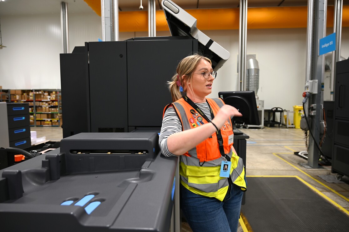 Eilish McDonald leans against a printer