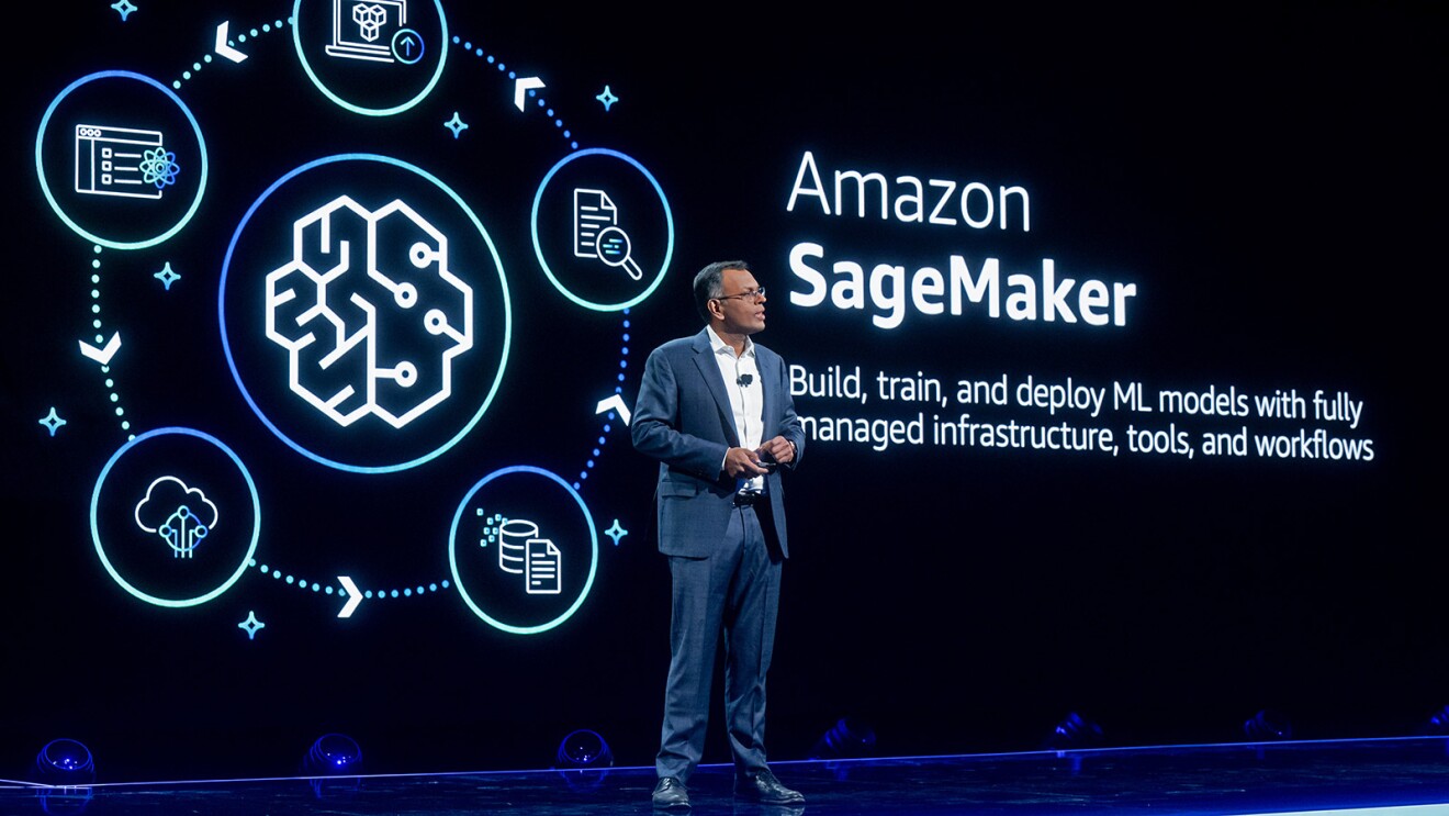 A photo of AWS Vice President of Data and AI Swami Sivasubramanian at AWS re:Invent 2023, presenting about Amazon SageMaker.
