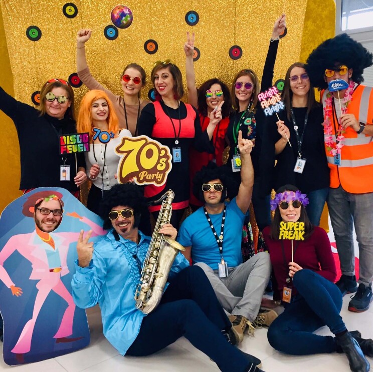 Amazon associates in our Milan fulfillment center participate in a 70s theme