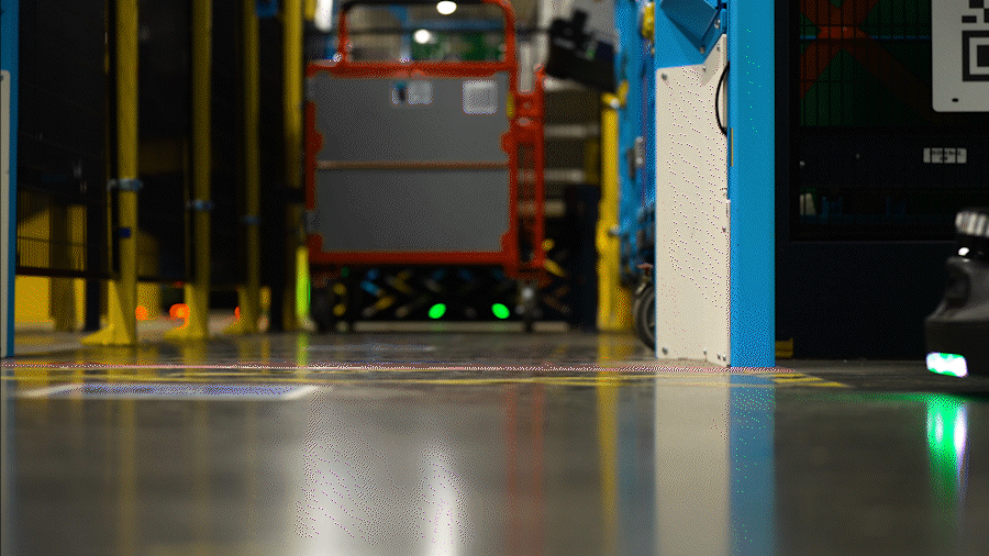A GIF of an Amazon robot, Proteus, moving items at a fulfillment center in Shreveport, Louisiana.