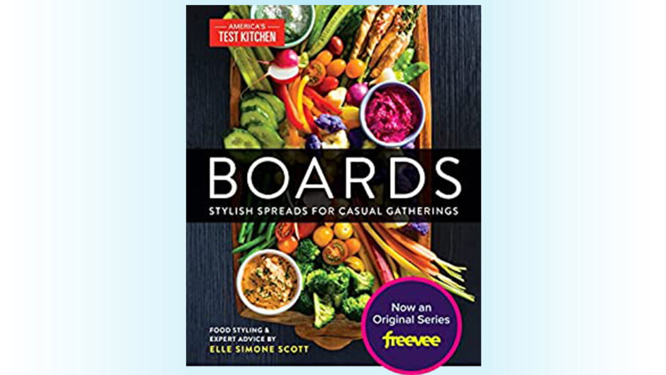 A photo of the book cover, "Boards: Stylish Spreads for Casual Gatherings". The cover features a board of appetizers such as vegetables and dips.