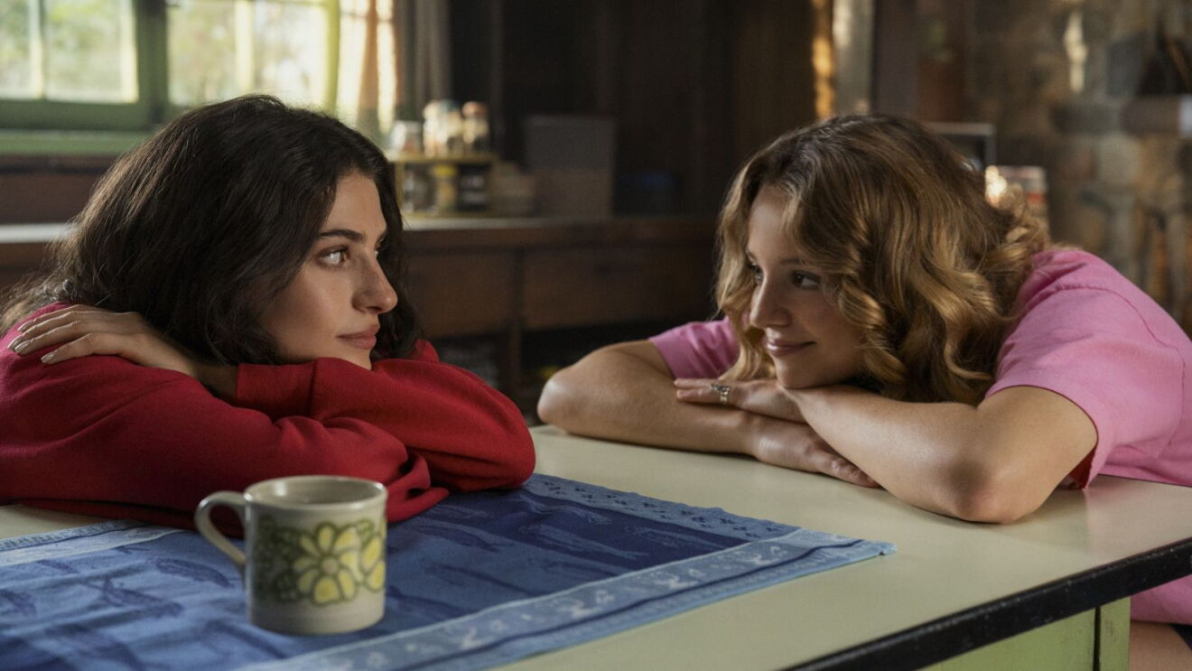 Still from Prime Video Original Series 'Sterling Point' featuring two women leaning over table