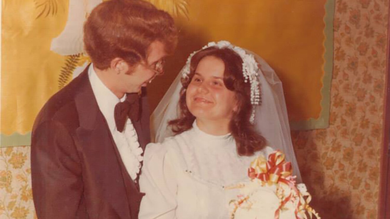 Vintage photograph of a young man and woman at their wedding, more than 30 years ago