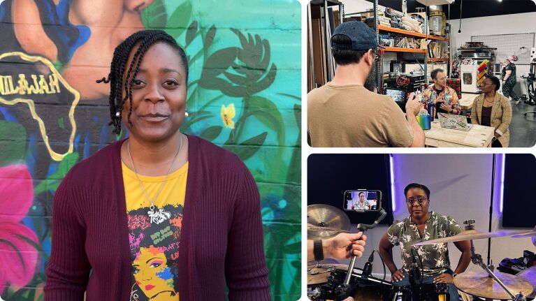 Woman in purple cardigan and yellow shirt poses in front of colorful mural