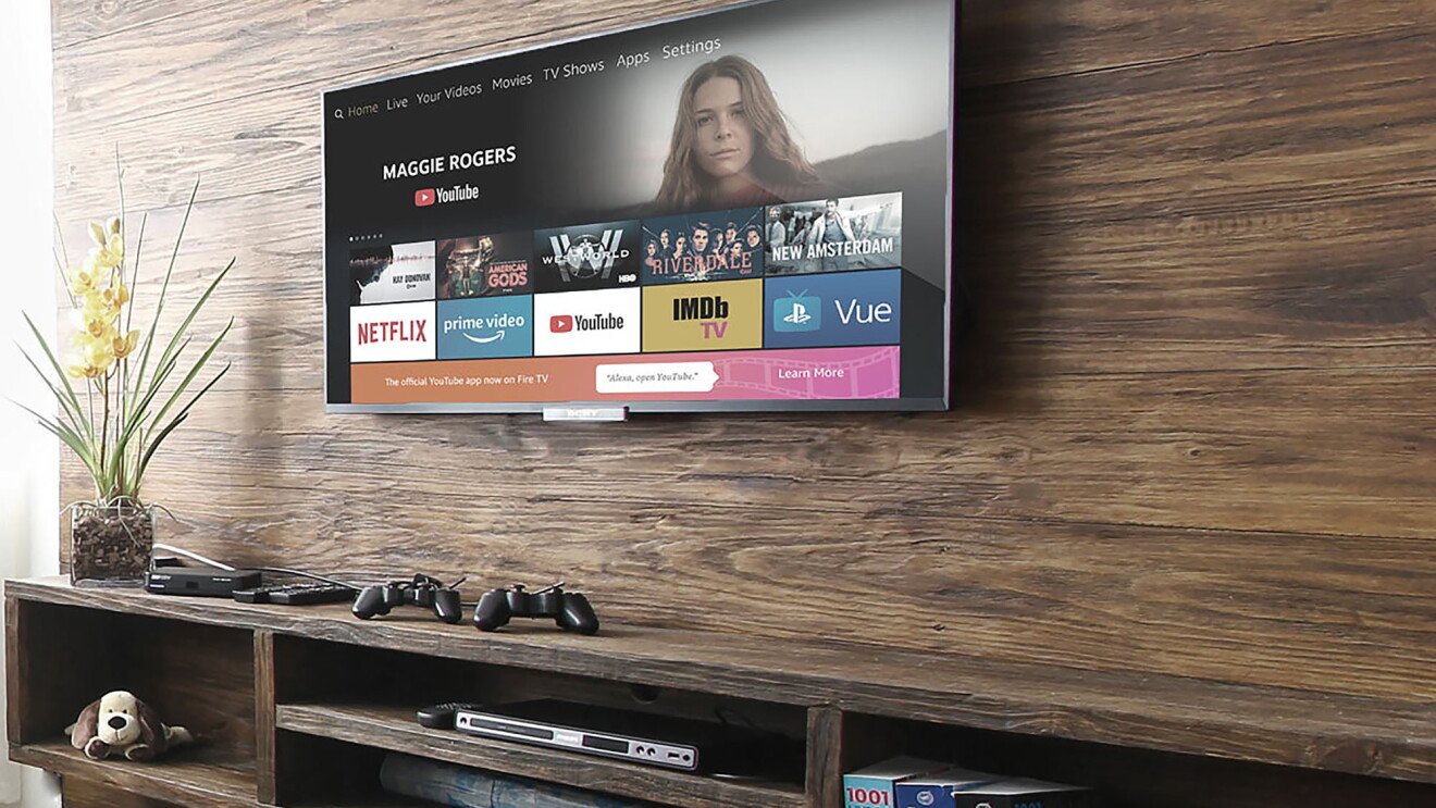 A television screen on a living room wall, showing a screen from YouTube on Fire TV. 