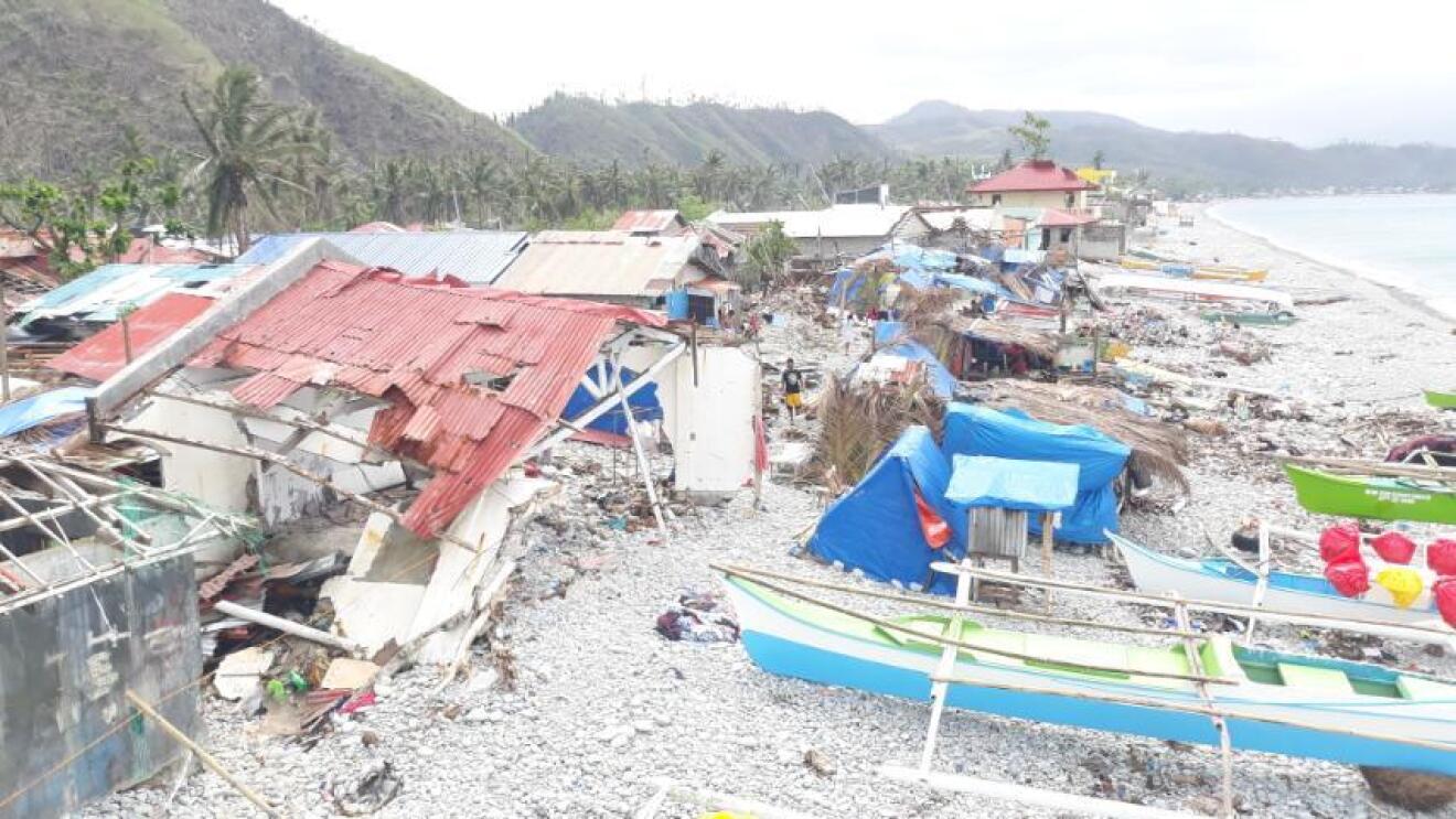 Shattered homes along the coastline of Surigao del Norte, Philippines.