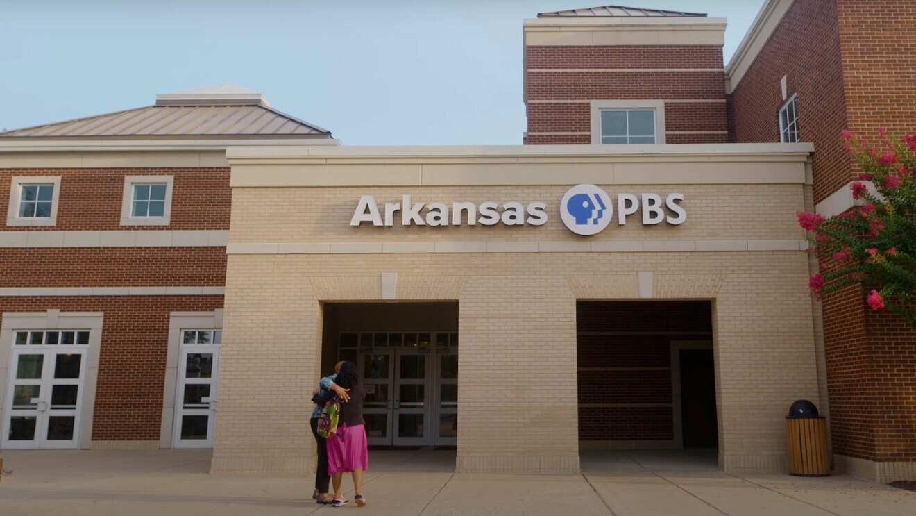 A photo of the entrance of the PBS headquarters in Arlington, Virginia.