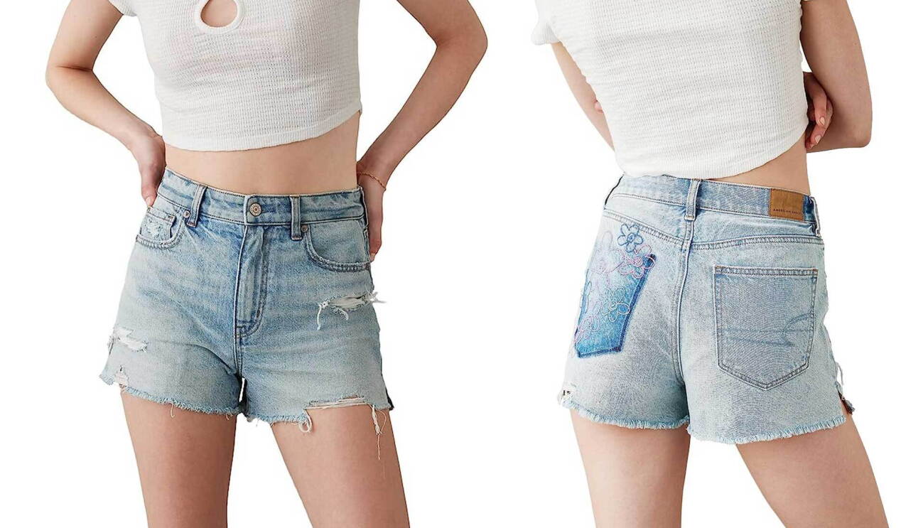 Image of the front and back of denim mom shorts.