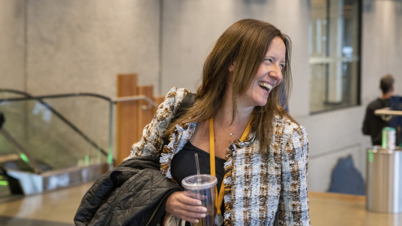 Beth Galetti smiles as she walks into the Seattle Amazon office.