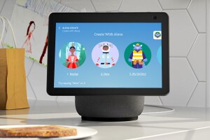 Amazon Echo Show sits on a countertop with a screen open that reads, "Create With Alexa."