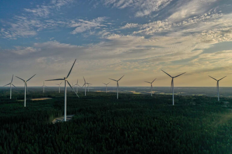 Photo looking into the horizon of wind turbines in Bäckhammar, Sweden