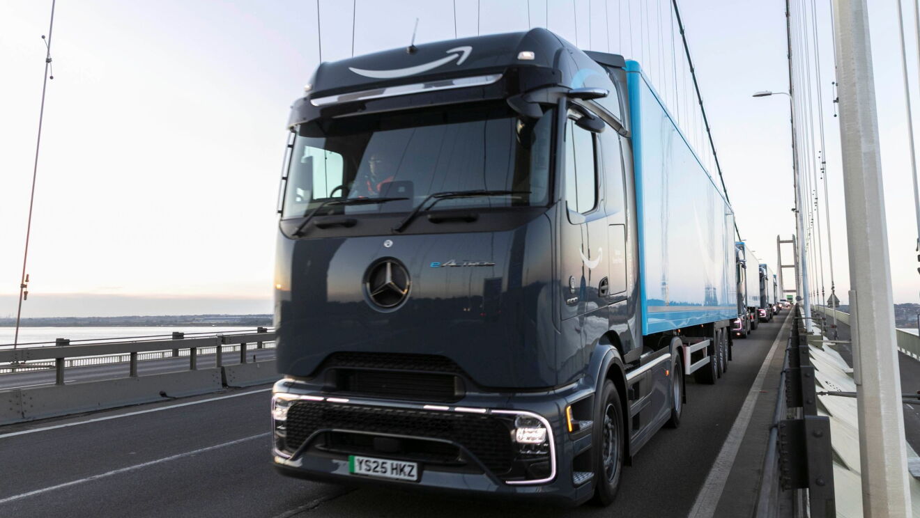 Amazon branded eHGV driving along eHGV