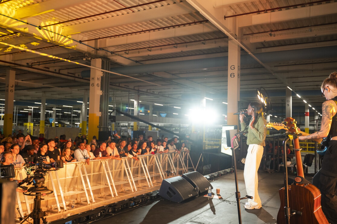 Audience of young people listen to Cat Burns at Amazon Apprenticeships event