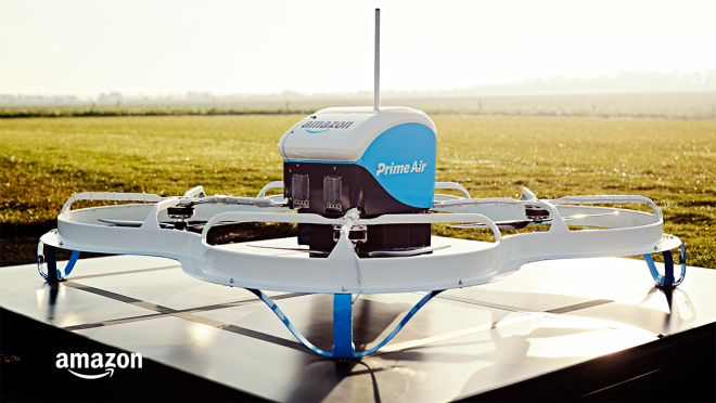 The Amazon Prime Air MK21 octocopter is parked on a base outside.