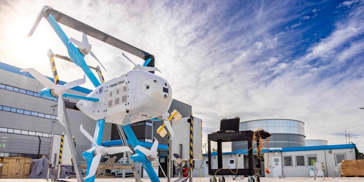 Large white and blue drone with multiple rotors