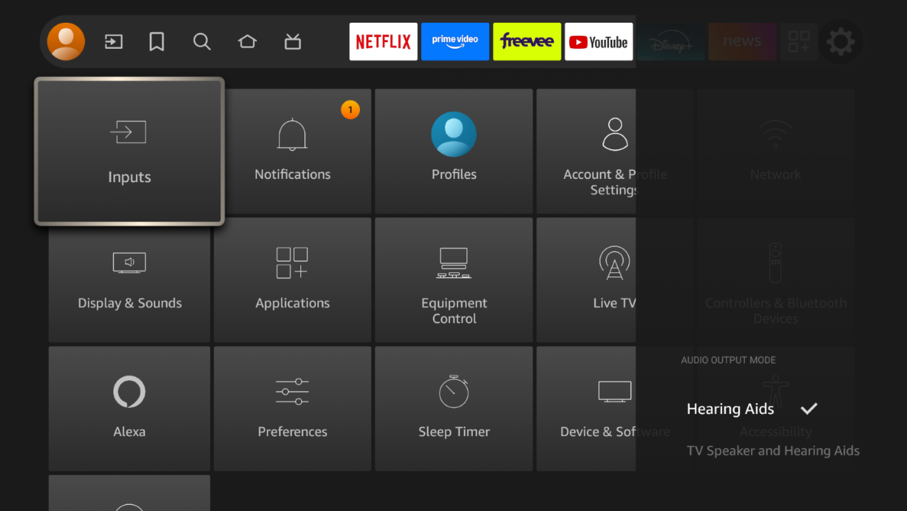 Fire TV menu with options for inputs, profiles, and device controls