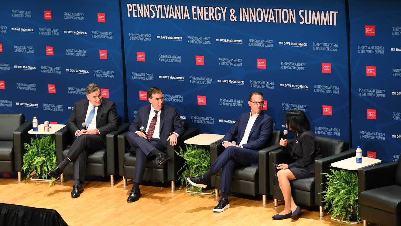 U.S. Senator Dave McCormick, AWS CEO Matt Garman, and Governor Josh Shapiro in a fireside chat at the Pennsylvania Energy and Innovation Summit.