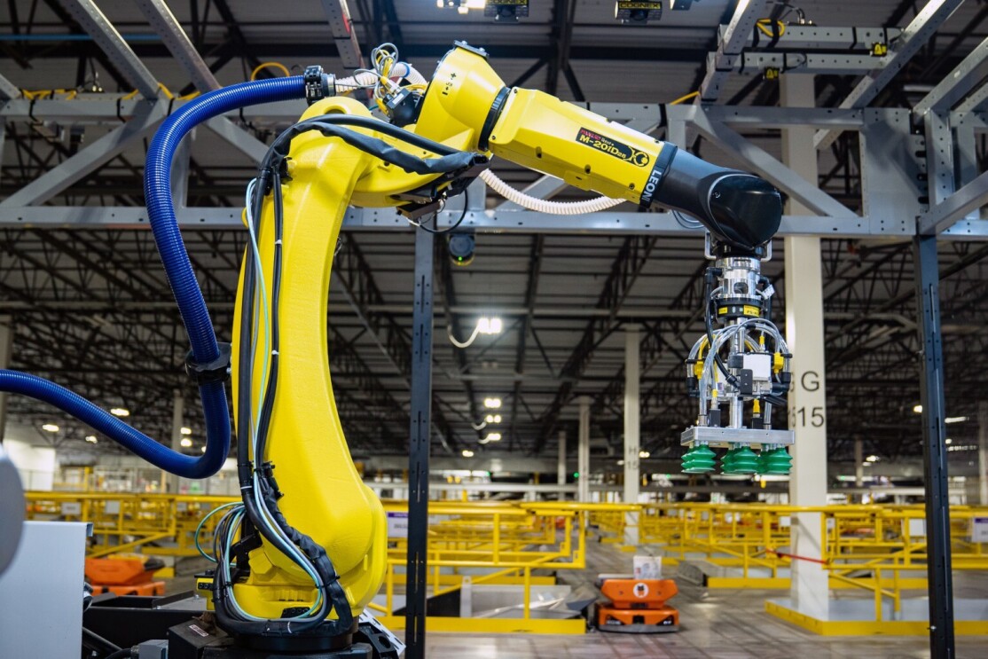 Robin, an Amazon robot arm systems works in a fulfillment center.