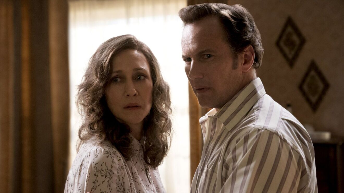 The Conjuring movie: Middle-aged couple in tense conversation, woman in floral blouse, man in striped shirt