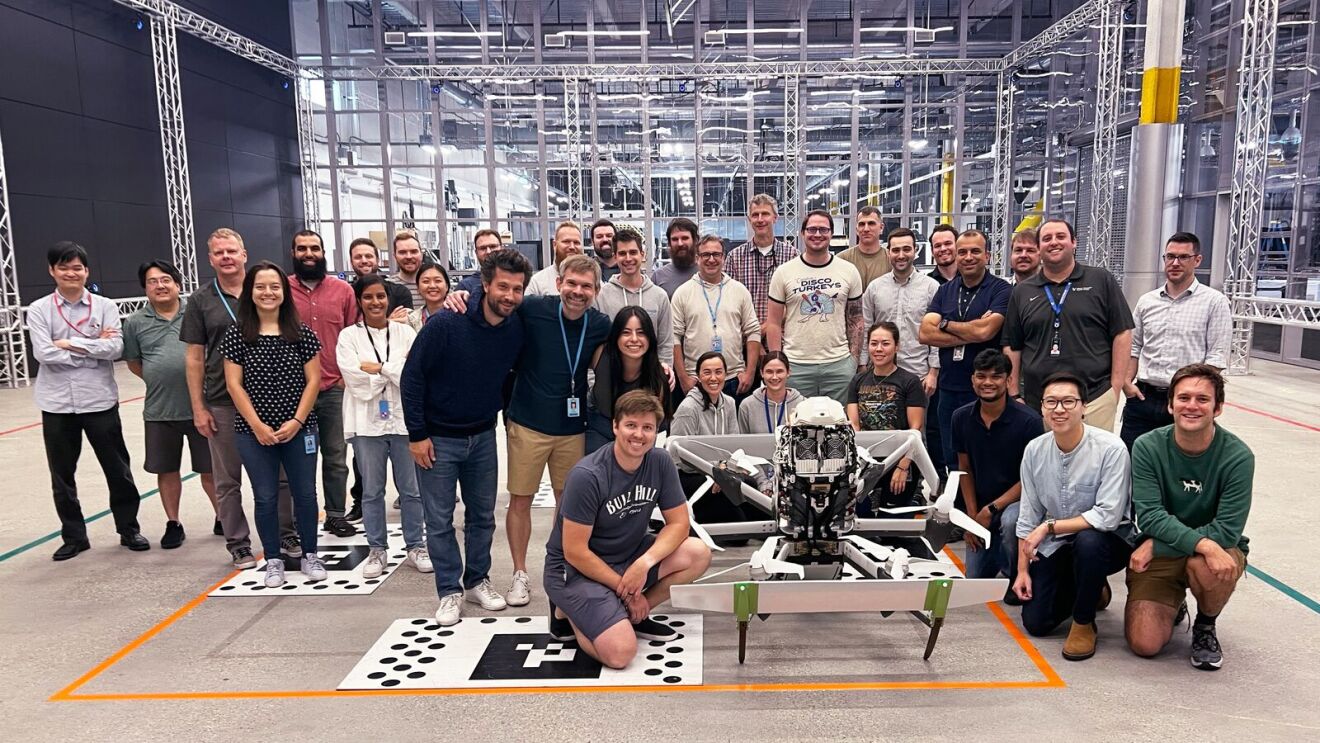 Some of the members of the Prime Air team that helped build and design the MK30 delivery drone.